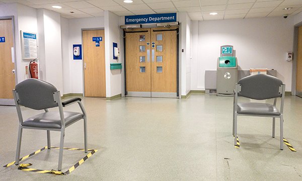 Socially distanced chairs in an emergency department Picture: Alamy