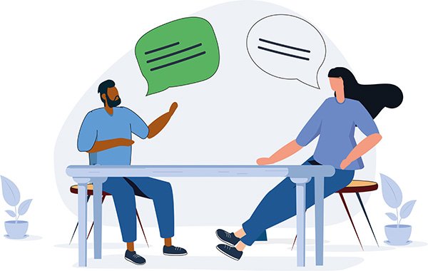 Illustration showing two nurses sitting at a table with speech bubbles above their heads, suggesting a ‘stay conversation’ is taking place