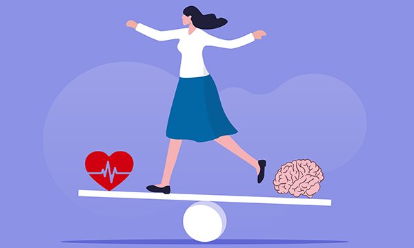 A woman attempting to balance a heart and a brain on either side of a see-saw on which she is standing, to illustrate meeting patients’ mental and physical health needs
