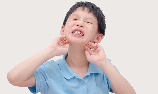 Picture shows a child scratching himself. Relying too much on observed stereotypical and repetitive behaviour may result in incorrect diagnosis of autism spectrum disorder in people with a learning disability and sensory impairments, a study suggests.