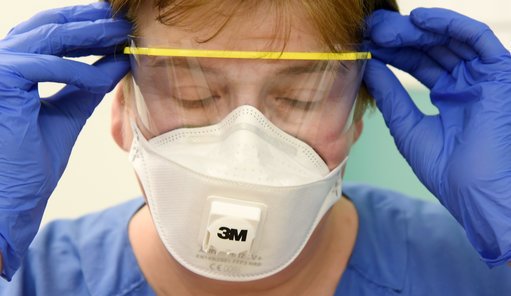 nurse wearing PPE