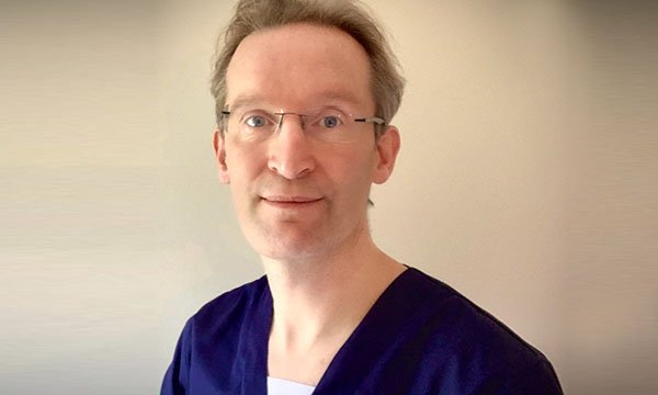 Consultant thoracic surgeon Joel Dunning is now working shifts as an ICU nurse