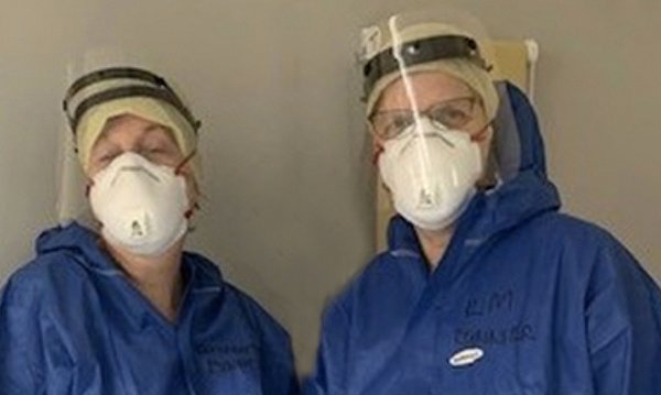 Elizabeth Tysoe and Kim Tolley in PPE